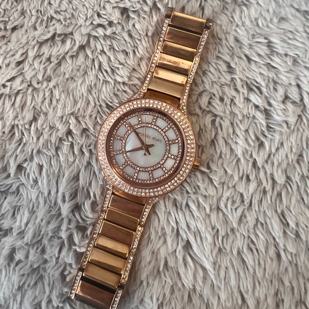 Rose told gold Michael Kors watch
